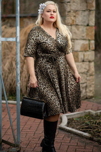 Customer wears our Matilda half sleeve wrap casual dress, in brown leopard print, with accessories