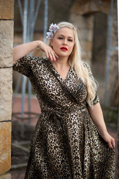 Customer wears our Matilda half sleeve wrap casual dress, in brown leopard print